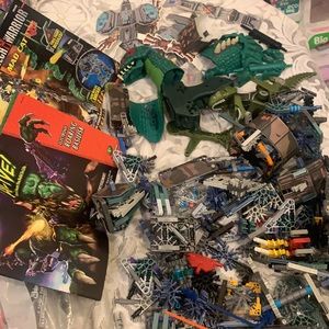 Lots of Knex parts two book ,mad cat parts and electronic roaring basilisk